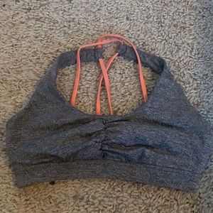 Grey and orange sports bra